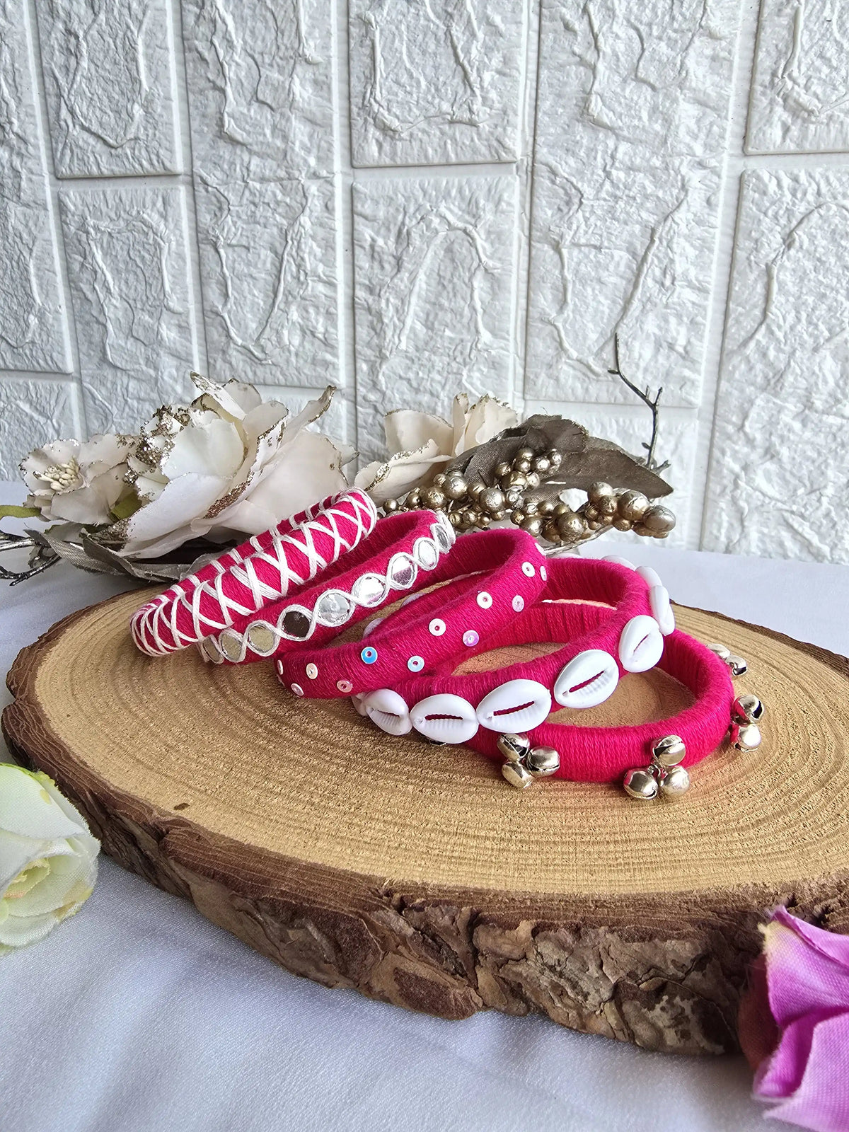 Aadhya Bangles pink thread bangles with mirror work and silver bells Closed up view