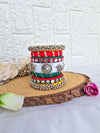 Aadhya Bangles pink thread bangles with Mirror work, kundan stone, silver charm ghughru and pom pom side view