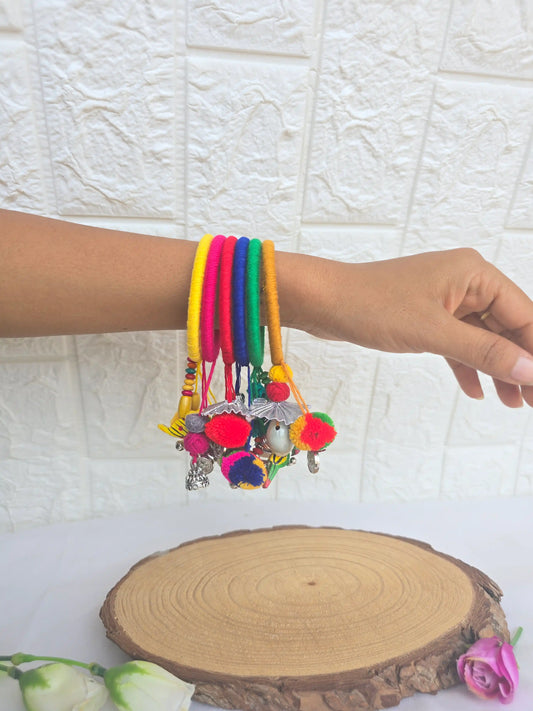 Aadhya Bangles Multicolor thread bangles with mirror work and silver bellskundan stone, silver charm ghughru,Parrot, Kowris and pom pom
