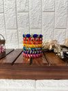 Aadhya Bangles — Multicolor thread bangles with mirror work, silver bells, kundan stones, silver charm ghungroo, parrot motifs, cowrie shells.