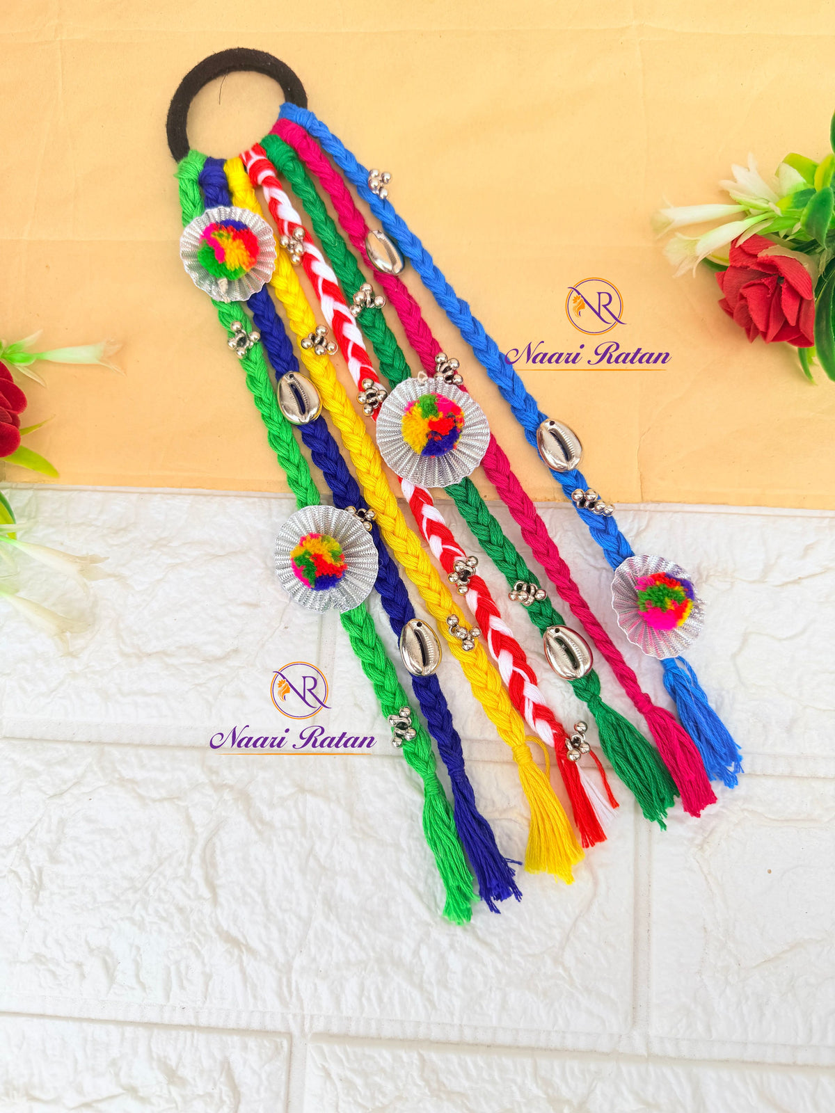 Rangeeli Hair Band HA02 Naari Ratan - multicolor braided hair accessory with cowrie shells and pom-poms Close Up View