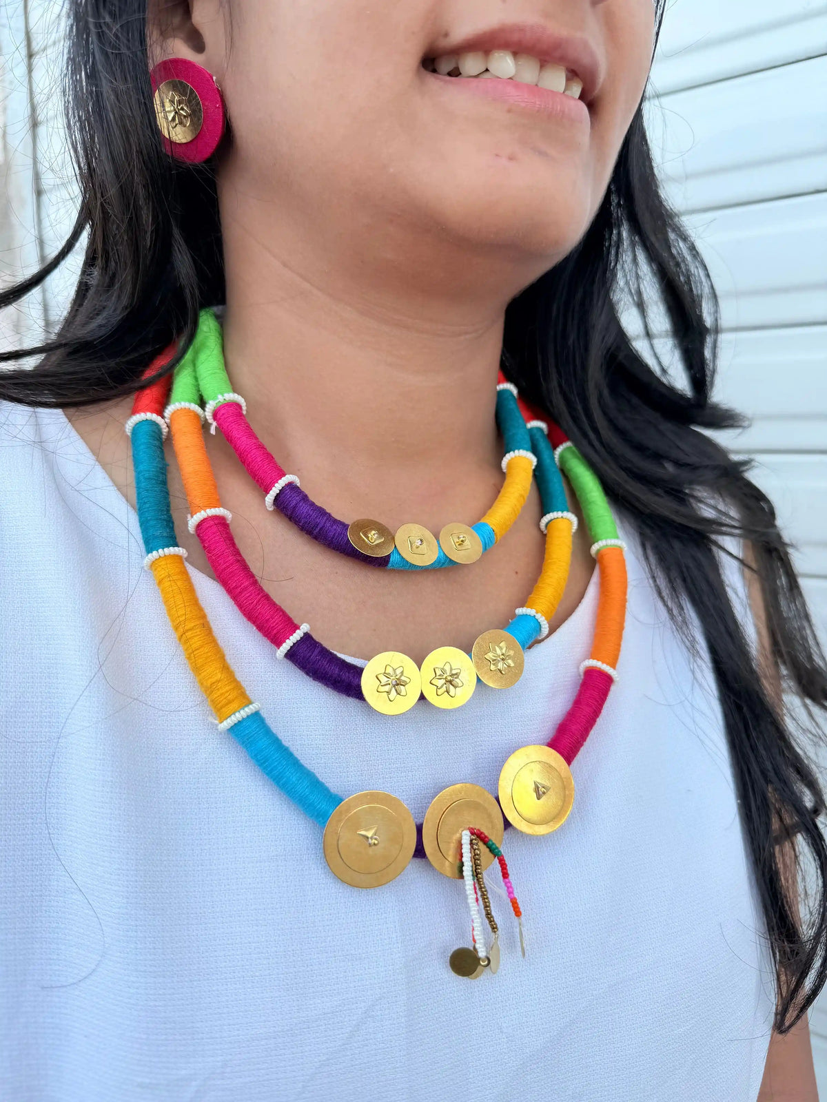 Rangeeli Layered Neckpiece NNS57 - Multicolor 3-layer thread necklace with gold charm accents by Naari Ratan