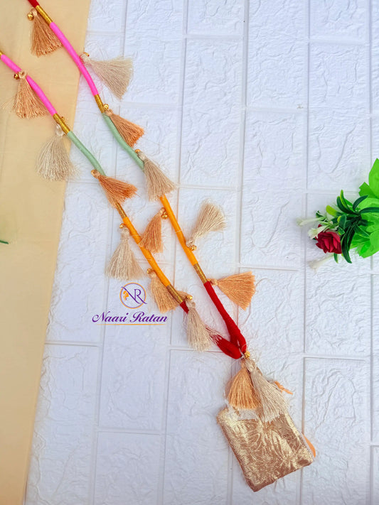 Mint, yellow and red thread-wrapped mobile sling bag with tassels by Naari Ratan Full view