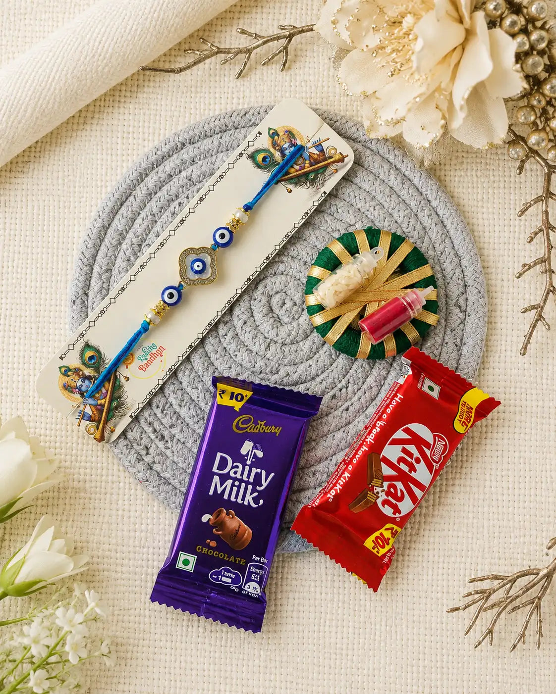 Rakhi Hamper RH01 with Rakhi and festive treats by Naari Ratan