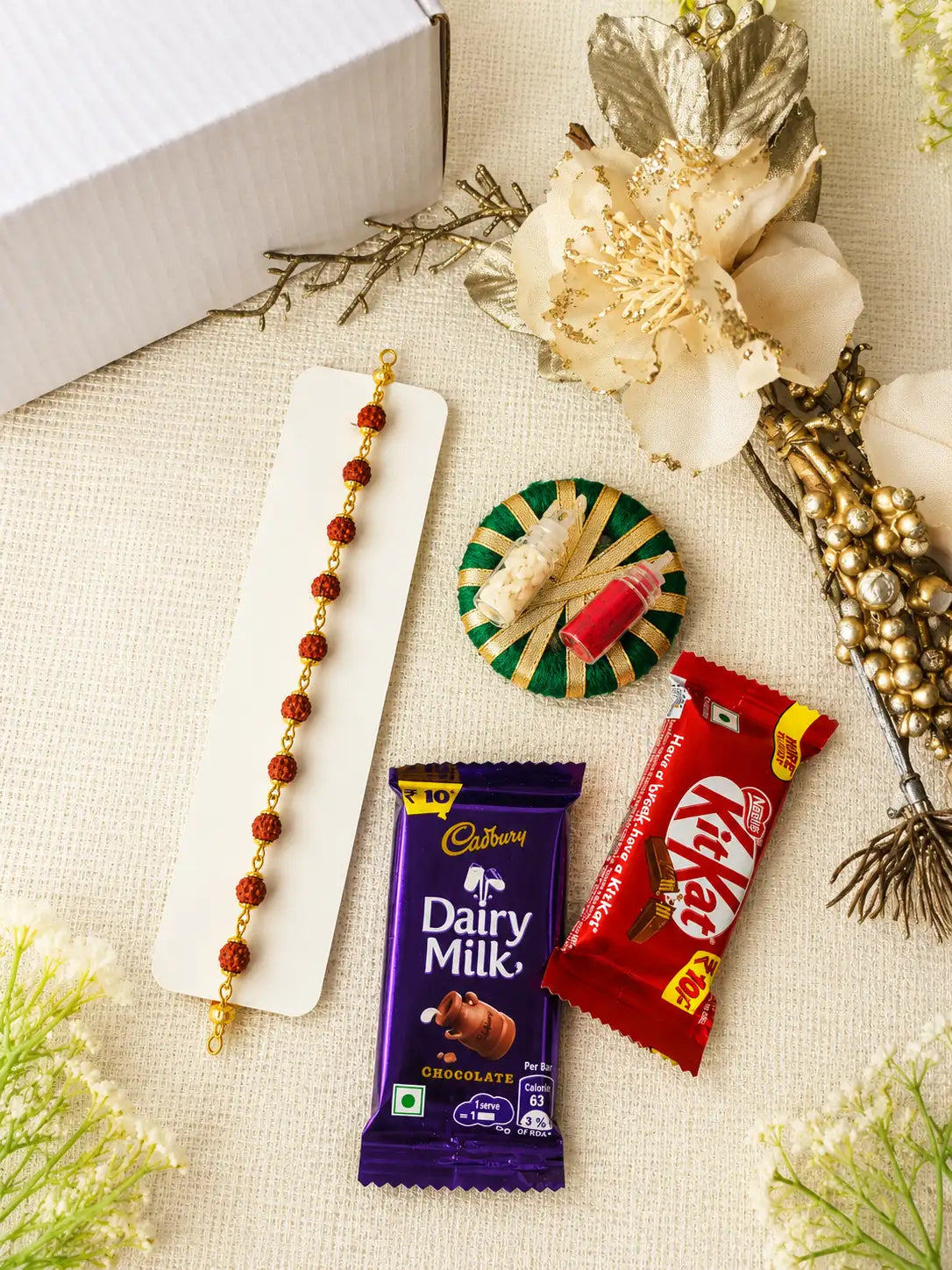Rakhi Hamper RH02 with Rakhi and festive treats by Naari Ratan