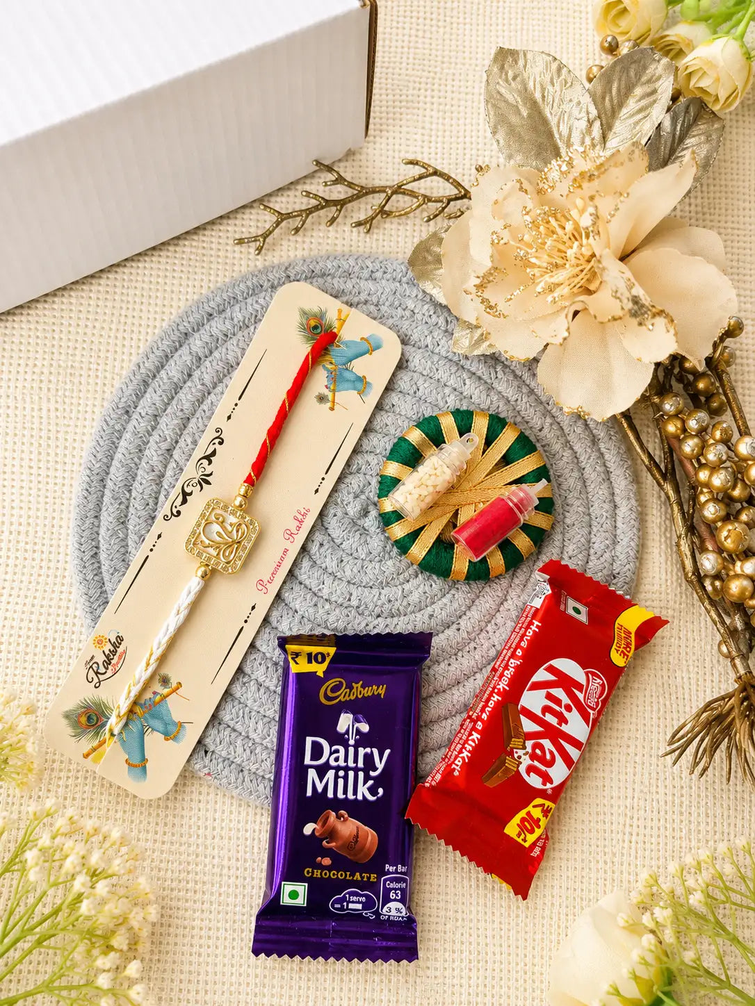 Rakhi Hamper RH03 with Rakhi and festive treats by Naari Ratan