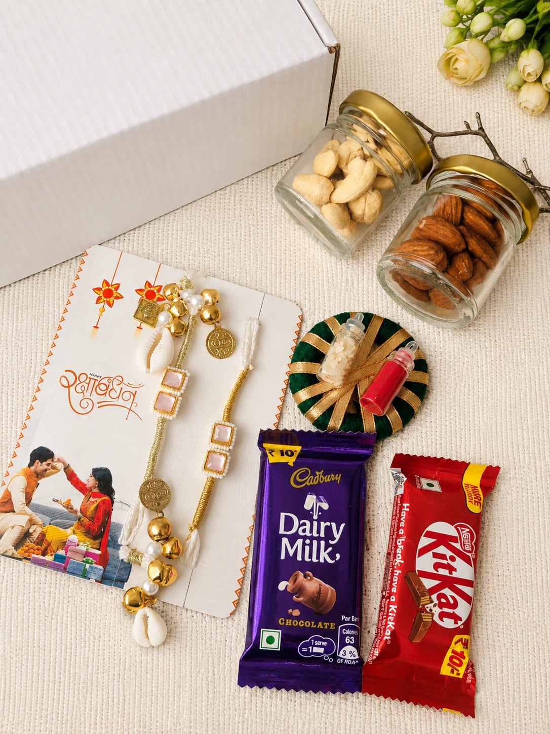 Rakhi Hamper RH08 with Rakhi and festive treats by Naari Ratan