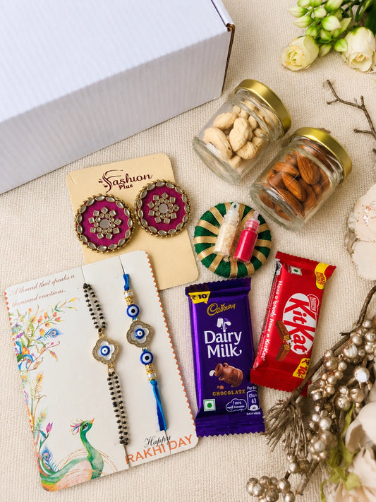 Rakhi Hamper RH12 with Rakhi and festive treats by Naari Ratan