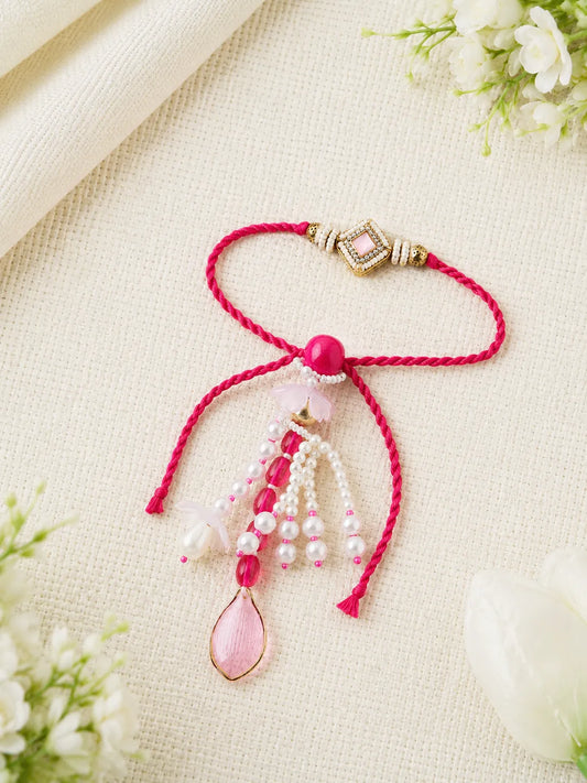 Handmade Sister Bhabhi Lumba Rakhi SB03 with pearl tassel and kundan design by Naari Ratan