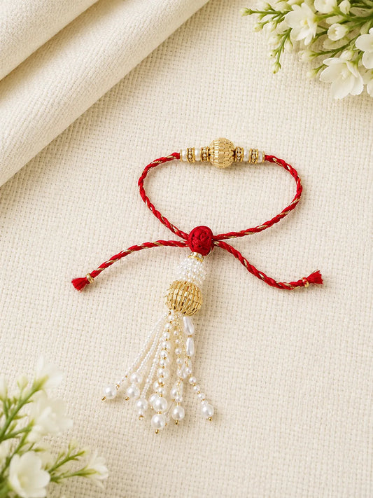 Handmade Sister Bhabhi Lumba Rakhi SB04 with pearl tassel and kundan design by Naari Ratan