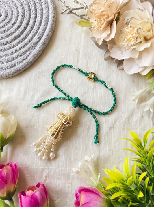 Handmade Sister Bhabhi Lumba Rakhi SB10 with pearl tassel and kundan design by Naari Ratan